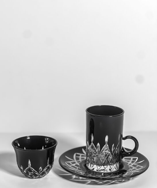 Set of black tea cups and coffee